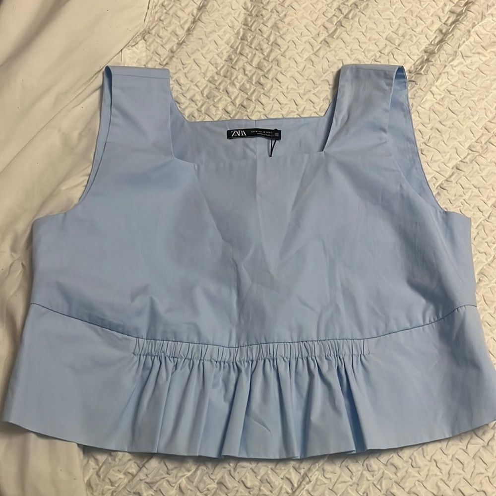 light blue Zara top in a size medium